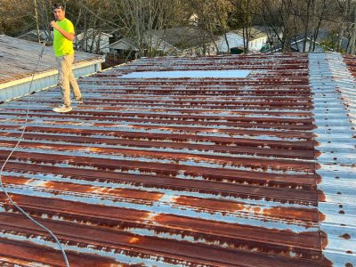 Rust-Damaged Residential Metal Roof Replacement